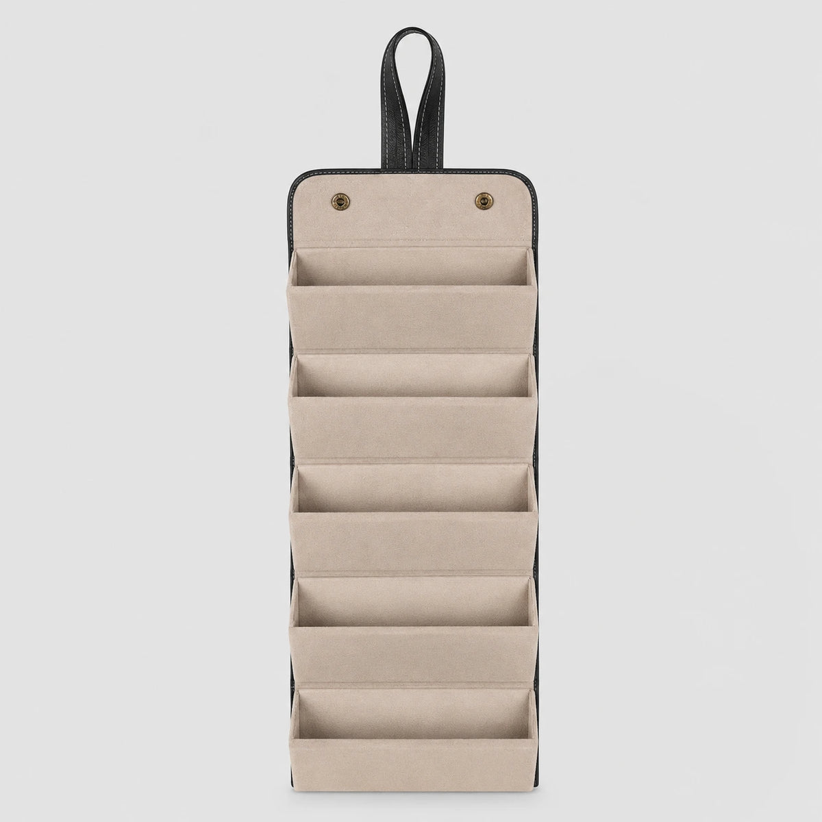 HARO Leather Travel Case open showing five compartments with microfiber dividers